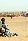 Translating Genocide: Three Students Journey to Sudan (2005)