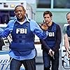 Forest Whitaker, Michael Kelly, and Matt Ryan in Criminal Minds: Suspect Behavior (2011)