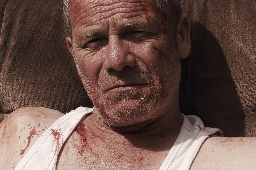 Peter Mullan in Tyrannosaur (2011)