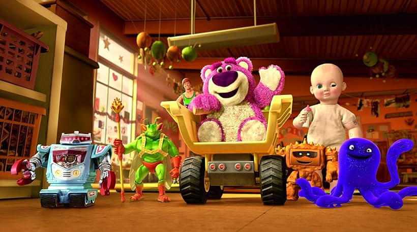 Whoopi Goldberg, Michael Keaton, Ned Beatty, Jack Angel, John Cygan, and Jan Rabson in Toy Story 3 (2010)