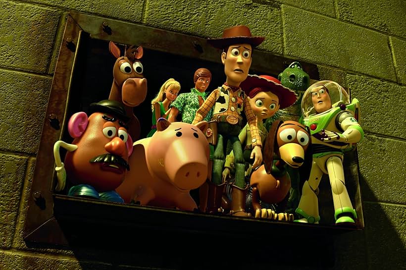 Tom Hanks, Joan Cusack, Michael Keaton, Tim Allen, John Ratzenberger, Wallace Shawn, Jodi Benson, Blake Clark, Don Rickles, Frank Welker, and Javier Fernández-Peña in Toy Story 3 (2010)