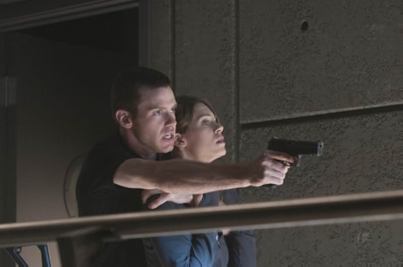 Bug Hall and Lyndsy Fonseca in Nikita (2010)