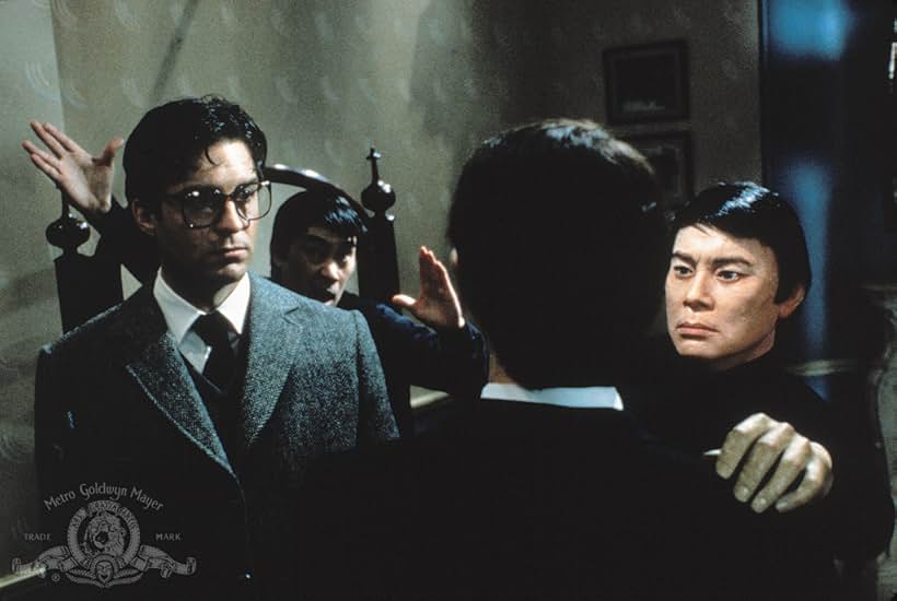 Burt Kwouk and Ted Wass in Curse of the Pink Panther (1983)