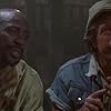 Louis Gossett Jr. and Chuck Norris in Firewalker (1986)