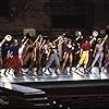 Michael Blevins, Yamil Borges, Jan Gan Boyd, Gregg Burge, Cameron English, Tony Fields, Nicole Fosse, Vicki Frederick, Michelle Johnston, Janet Jones, Pam Klinger, Audrey Landers, Charles McGowan, Alyson Reed, Justin Ross, Blane Savage, and Matt West in A Chorus Line (1985)