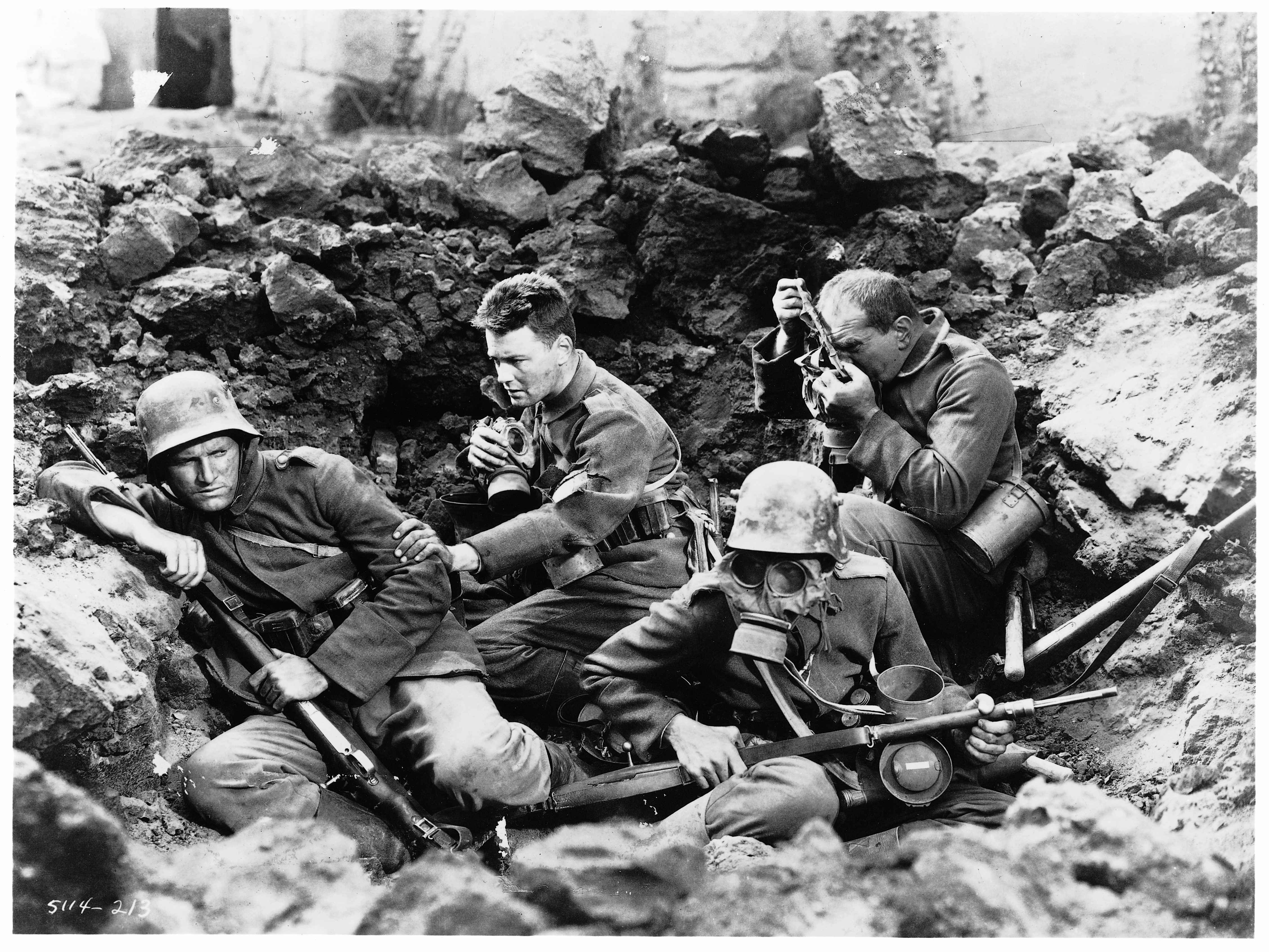 Lew Ayres, G. Pat Collins, and Louis Wolheim in All Quiet on the Western Front (1930)