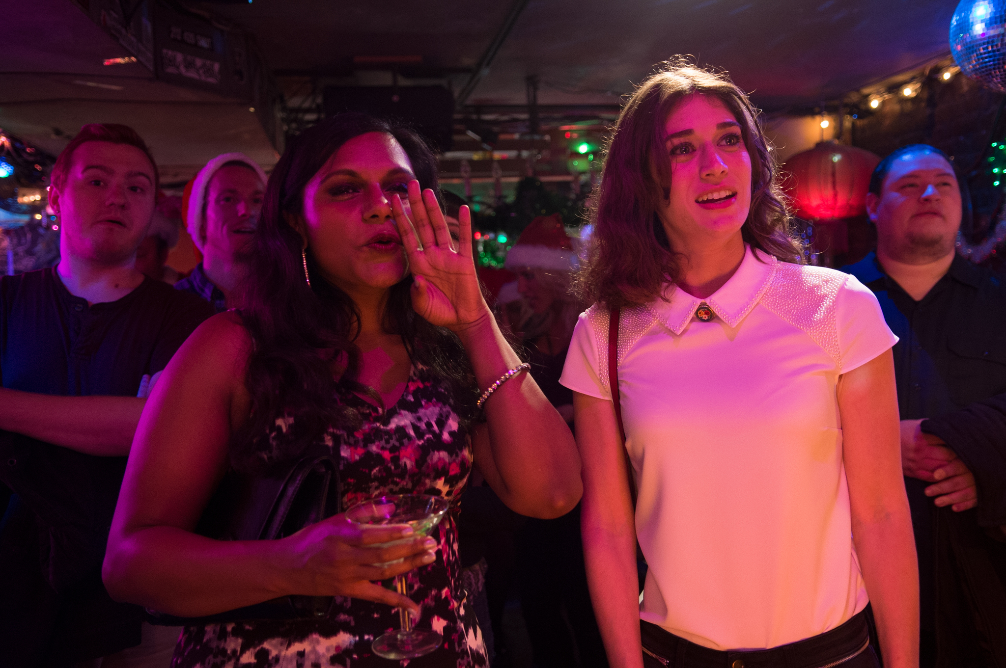 Lizzy Caplan and Mindy Kaling in The Night Before (2015)