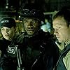 Dina Meyer, Donnie Wahlberg, and Lyriq Bent in Saw II (2005)