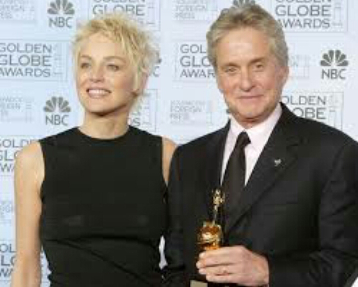 Michael Douglas and Sharon Stone at an event for The 61st Annual Golden Globe Awards (2004)