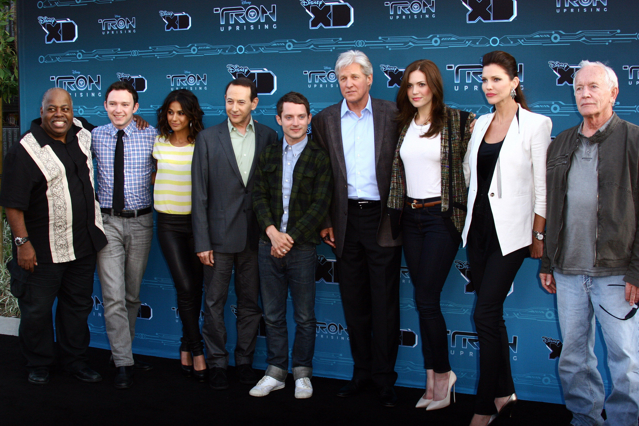 Bruce Boxleitner, Lance Henriksen, Paul Reubens, Elijah Wood, Reginald VelJohnson, Emmanuelle Chriqui, Mandy Moore, Tricia Helfer, and Nate Corddry at an event for Tron: Uprising (2012)