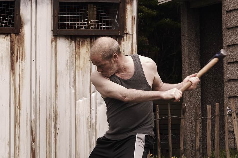 Peter Mullan in Tyrannosaur (2011)