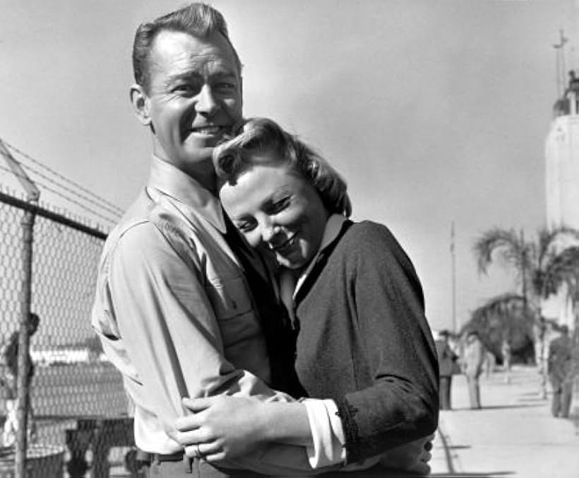 June Allyson and Alan Ladd on the set of "The McConnell Story"