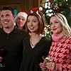 Emily Tennant, Cora Matheson, and Michael Strickland in Holiday Hotline (2023)