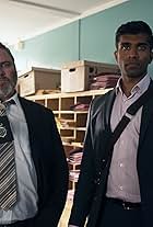 Alex Ferns and Nikesh Patel in The Devil's Hour (2022)