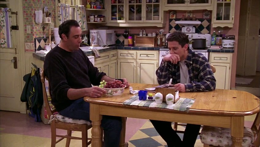 Brad Garrett and Ray Romano in Everybody Loves Raymond (1996)