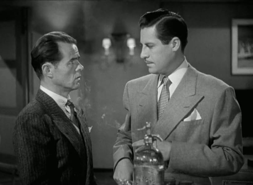 Elisha Cook Jr. and John Hodiak in Two Smart People (1946)