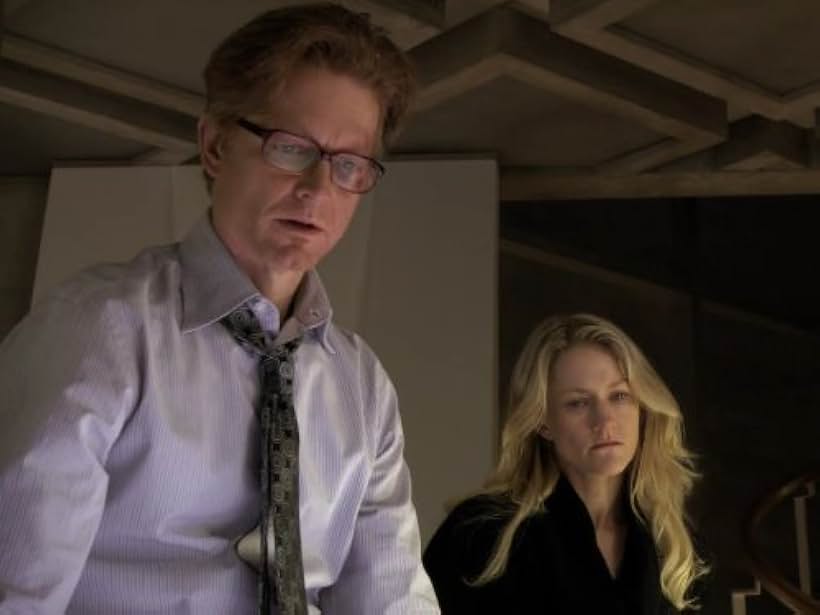 Eric Stoltz and Paula Malcomson in Caprica (2009)