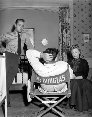 June Allyson and Alan Ladd with Dir. Gordon Douglas on the set of "The McConnell Story"