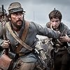 Matthew McConaughey and Jacob Lofland in Free State of Jones (2016)