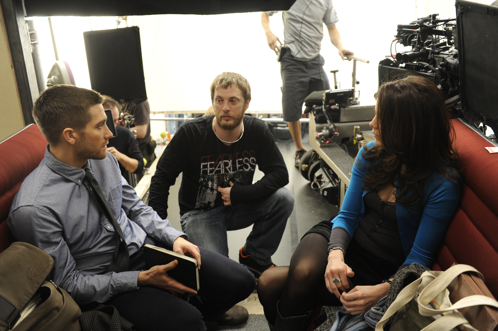 Jake Gyllenhaal, Michelle Monaghan, and Duncan Jones in Source Code (2011)