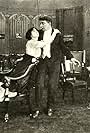 Herbert Prior and Mabel Trunnelle in Does Your Wife Love You? (1912)