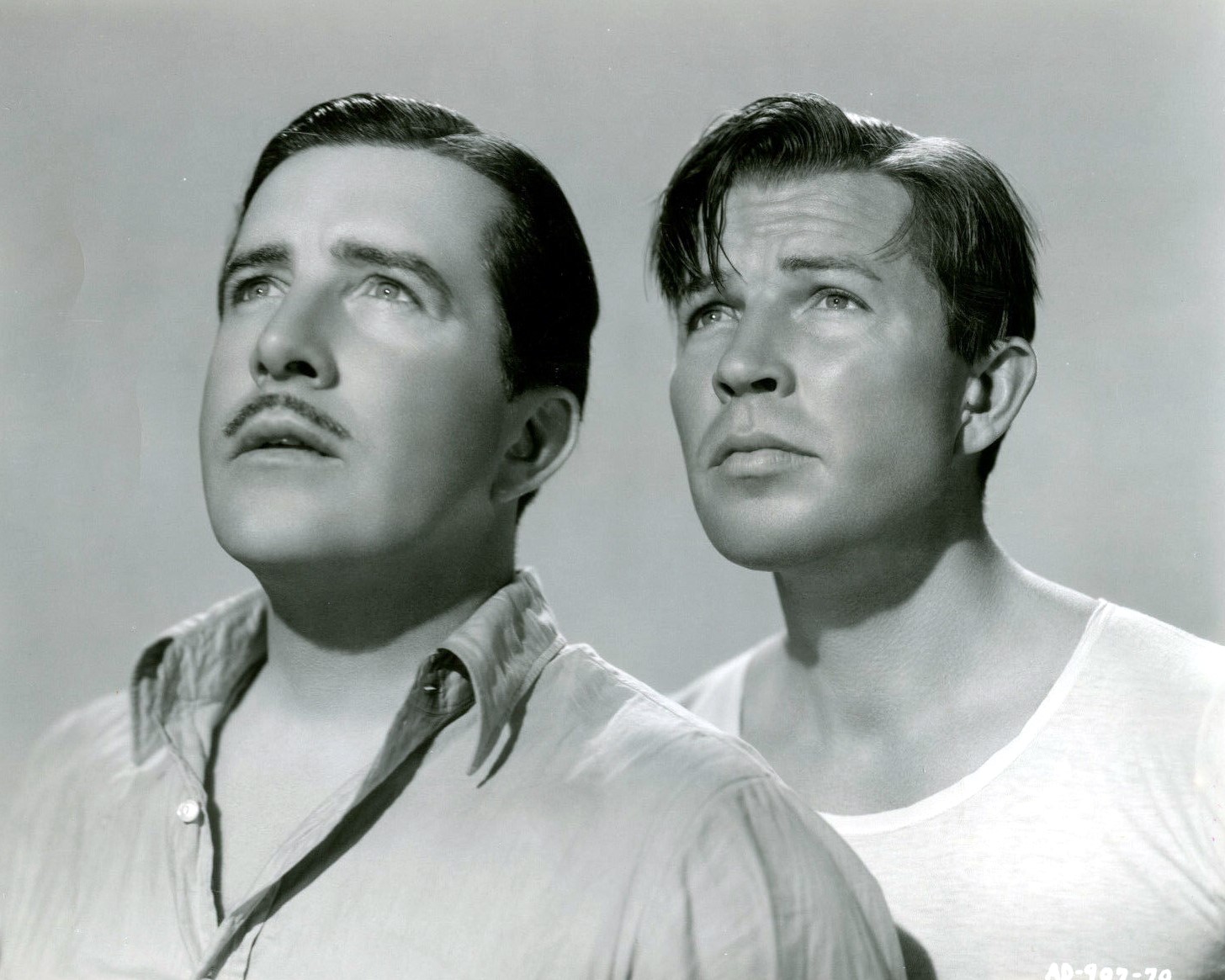 John Boles and Bruce Cabot in Sinners in Paradise (1938)