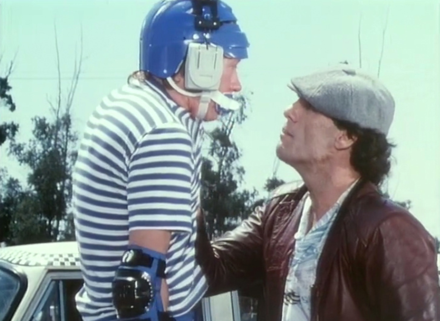 Robert Davi and Enn Reitel in The Optimist (1983)