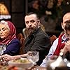 Nejat Isler, Emel Göksu, Canan Erguder, and Mert Denizmen in Aile (2023)