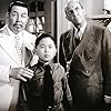 Warner Oland, Layne Tom Jr., and Andrew Tombes in Charlie Chan at the Olympics (1937)