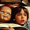 Brad Dourif and Alex Vincent in Child's Play (1988)