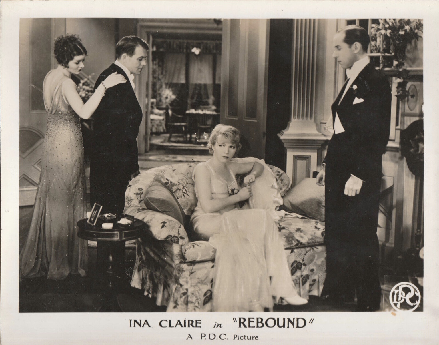 Myrna Loy, Robert Ames, and Ina Claire in Rebound (1931)