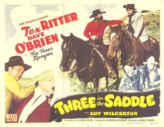 Edward Howard, Charles King, Dave O'Brien, Tex Ritter, and Guy Wilkerson in Three in the Saddle (1945)