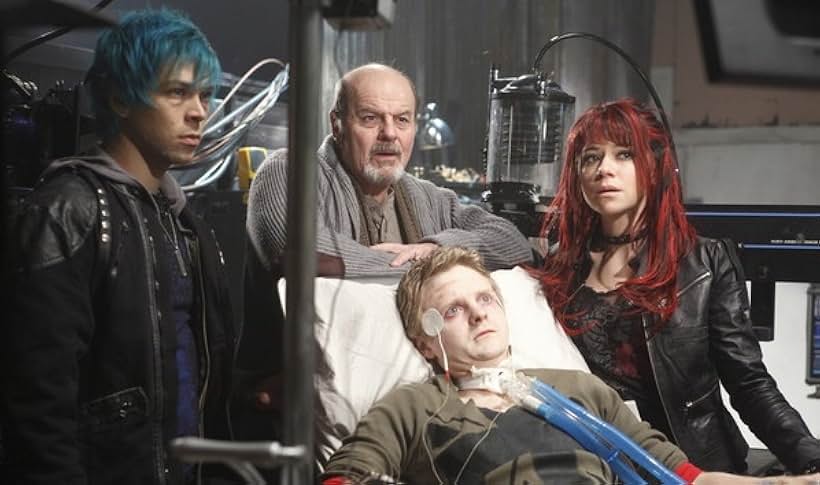 Michael Ironside, Chad Krowchuk, Tatiana Maslany, and Juan Riedinger in Hardwired (2009)