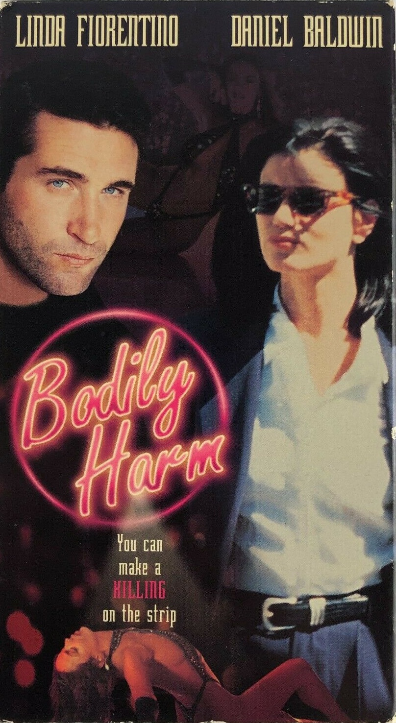 Linda Fiorentino and Daniel Baldwin in Bodily Harm (1995)