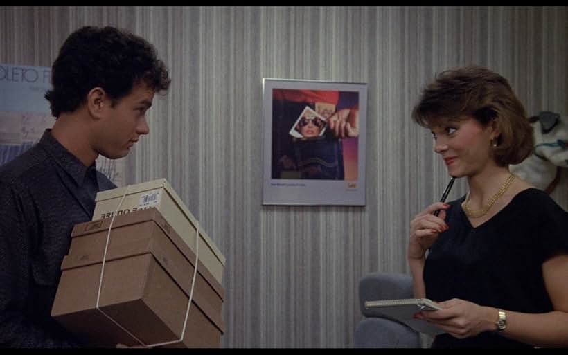 Tom Hanks and Carol Messing in Nothing in Common (1986)