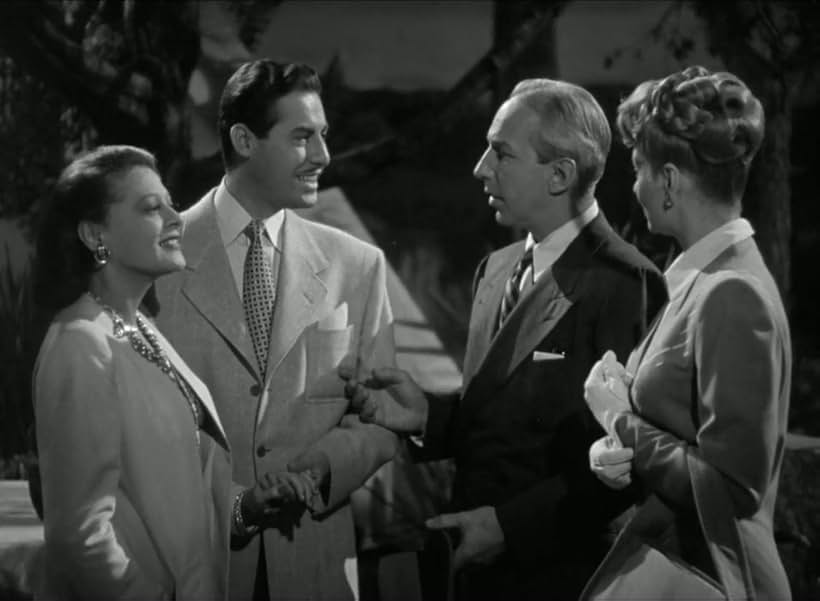 Lucille Ball, John Hodiak, Lloyd Nolan, and Lenore Ulric in Two Smart People (1946)