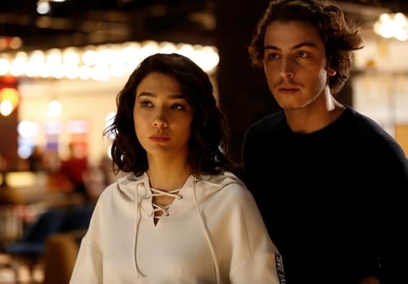 Aybüke Pusat and Boran Kuzum in Falcon Crest (2018)