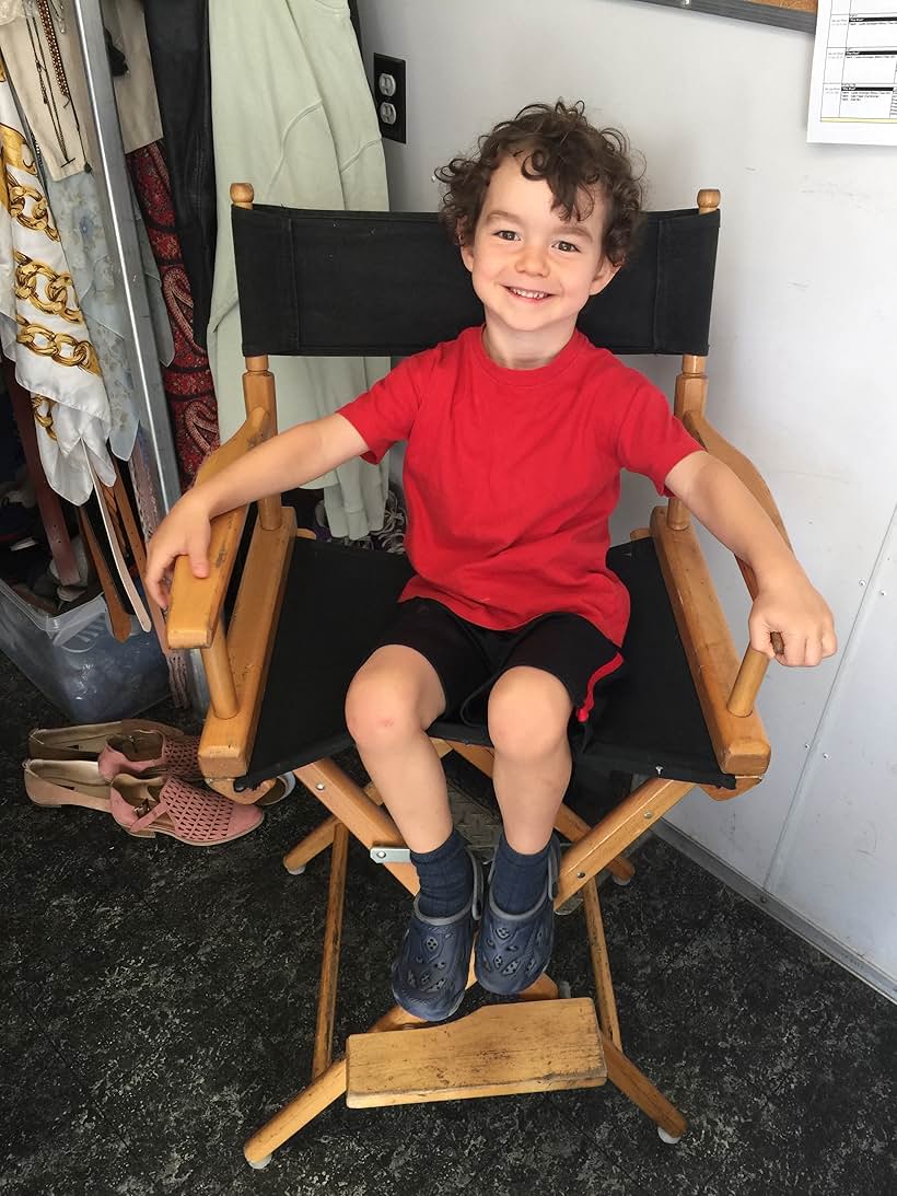 Calix relaxing on set for a commercial shoot.