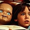 Brad Dourif and Alex Vincent in Child's Play (1988)