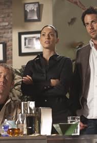 Colin Ferguson, Salli Richardson-Whitfield, Erica Cerra, and Niall Matter in Eureka (2006)