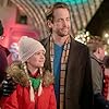 Myla Volk and Niall Matter in Holiday Hotline (2023)