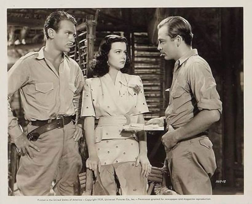 Joan Bennett, Douglas Fairbanks Jr., and John Howard in Green Hell (1940)