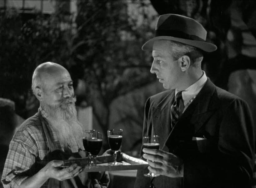 Lloyd Nolan in Two Smart People (1946)