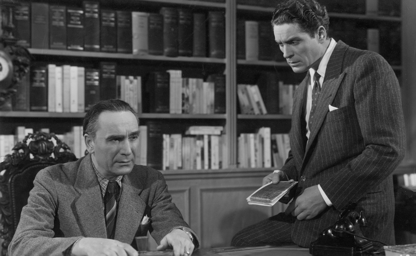 Juan José Miguez and Domingo Sapelli in Morir en su ley (1949)