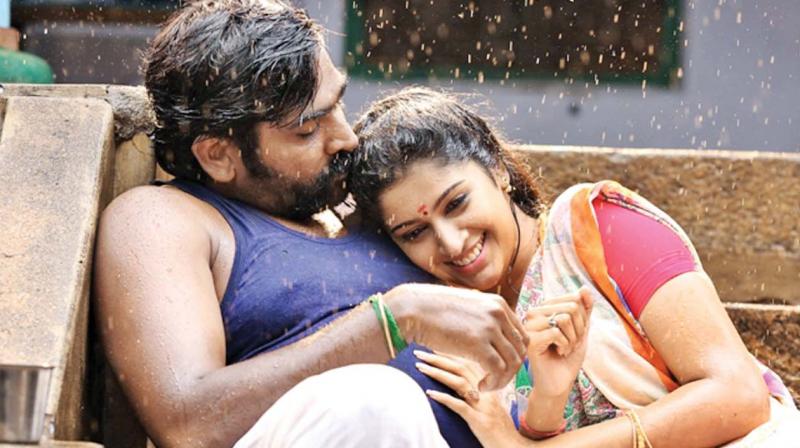 Vijay Sethupathi and Tanya S Ravichandran in Karuppan (2017)