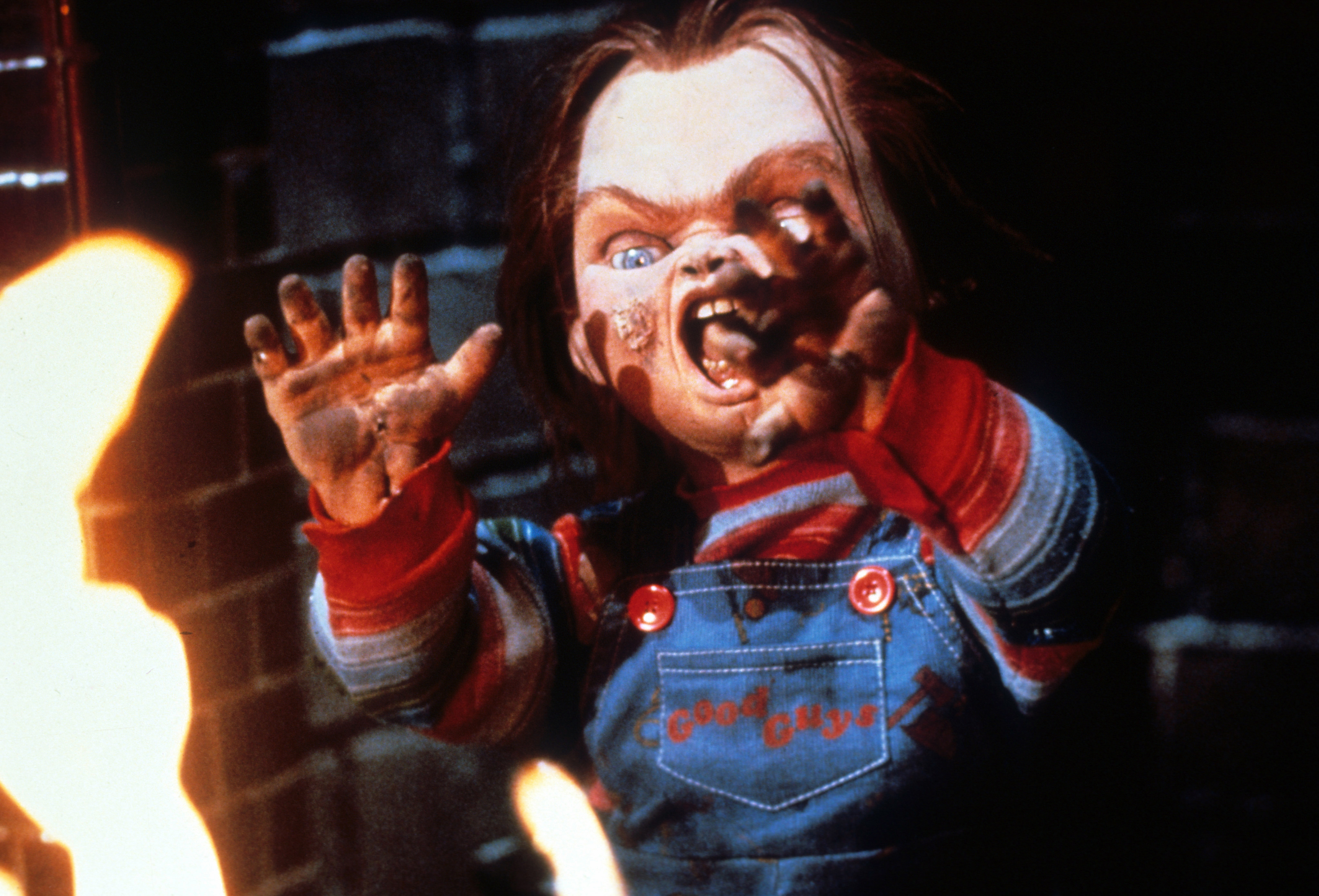 Brad Dourif, Ed Gale, and Hunter Marks in Child's Play (1988)