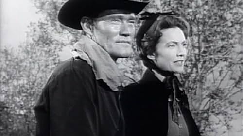 Chuck Connors and Joan Leslie in Branded (1965)