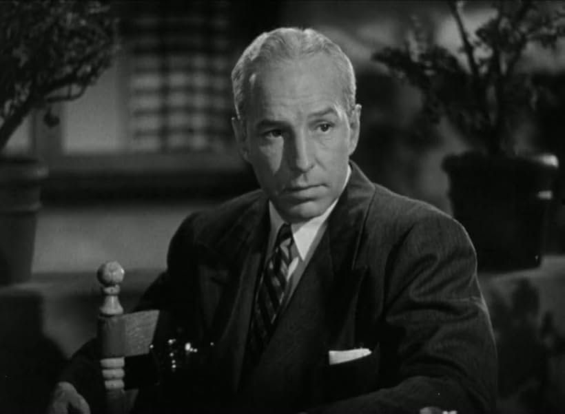 Lloyd Nolan in Two Smart People (1946)