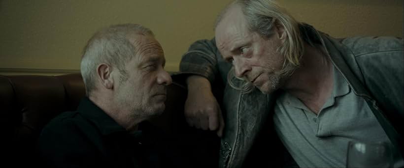 Ned Dennehy and Peter Mullan in Tyrannosaur (2011)