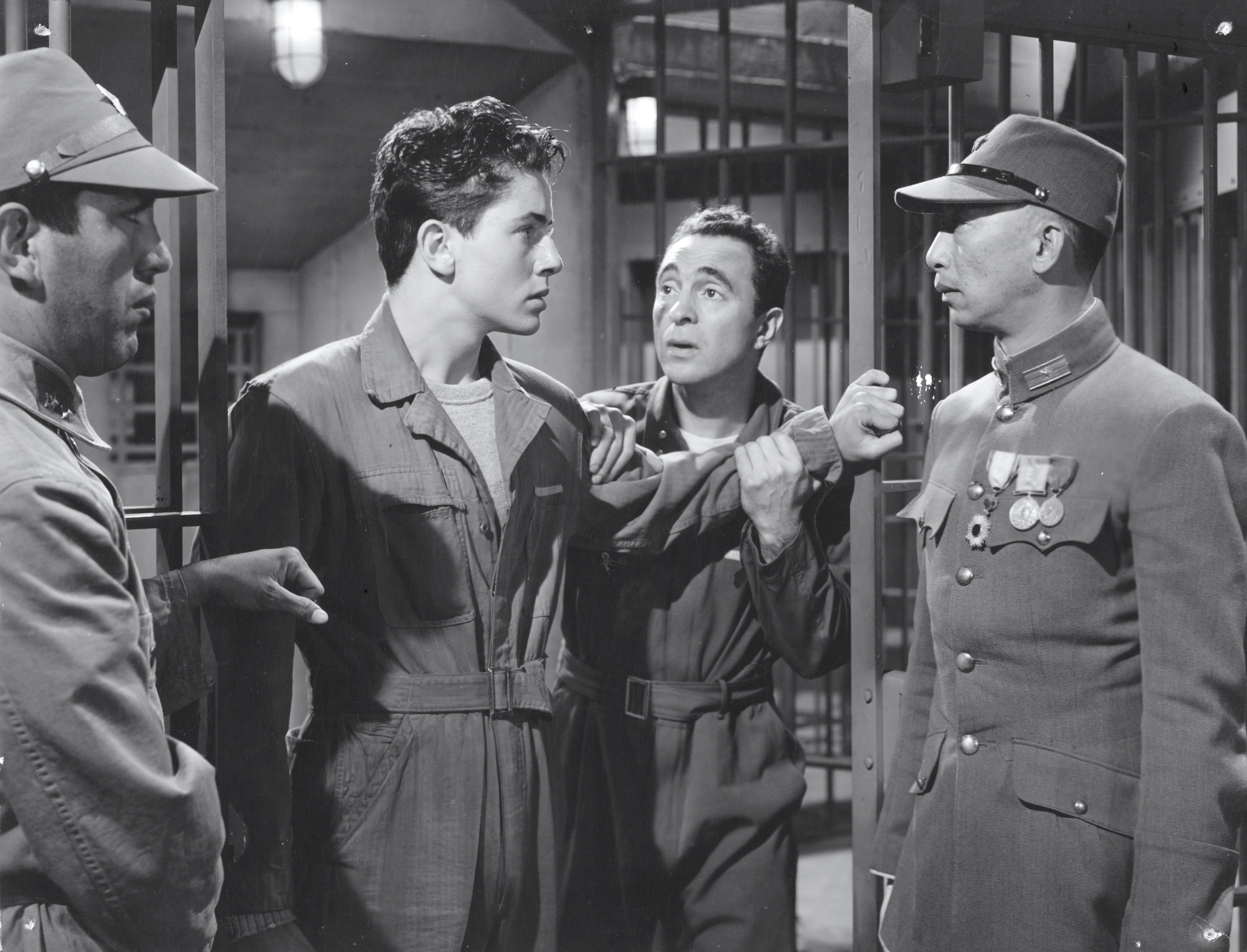 Farley Granger, Sam Levene, and Richard Loo in The Purple Heart (1944)